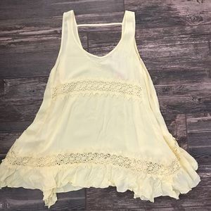 Yellow sleeveless flowing top